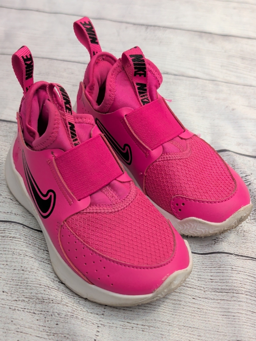 Nike Kids Bright Pink Slip-On Sneakers with Black Swoosh